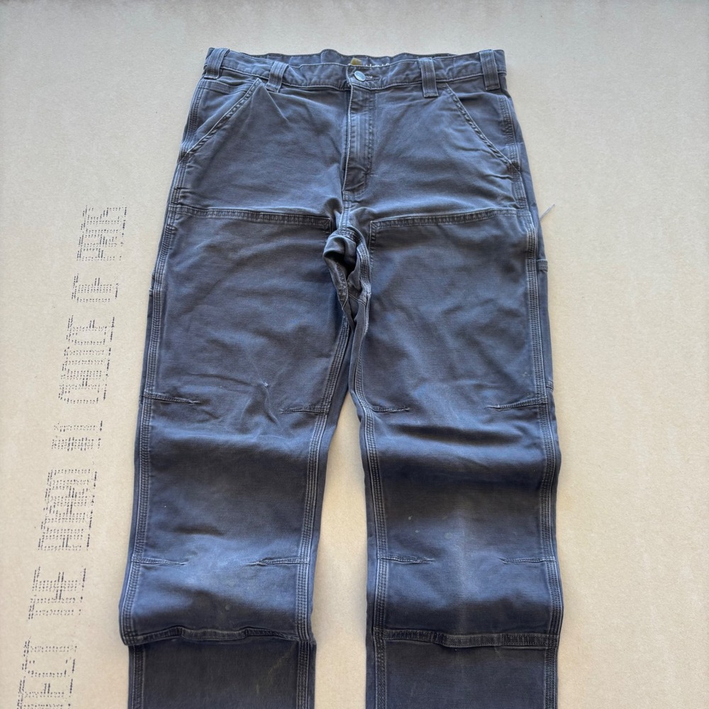 Carhartt Men's Work Pants in Dark Blue 34X34 but fit more like 32X34
